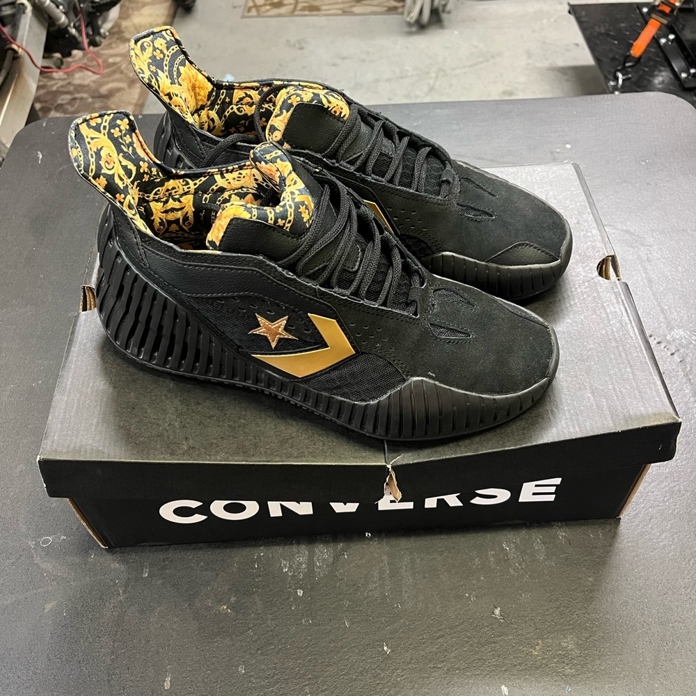 Converse Black and Gold Athletic Shoes